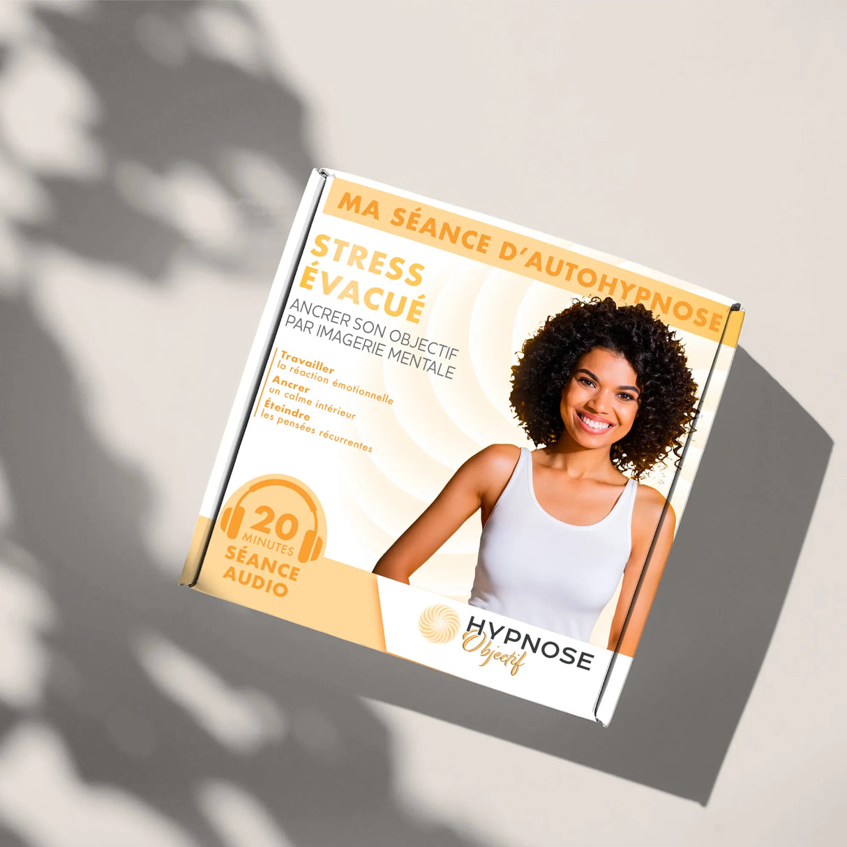 Box Stress Évacué posée en situation lifestyle sur une table – séance d’auto-hypnose –