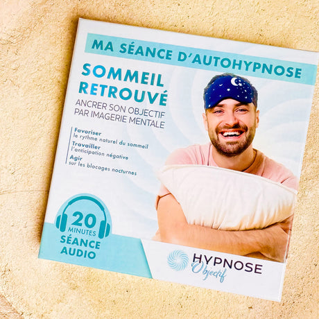 Box Sommeil Retrouvé posée sur une pierre naturelle – séance d’auto-hypnose box HypnoseObjectif